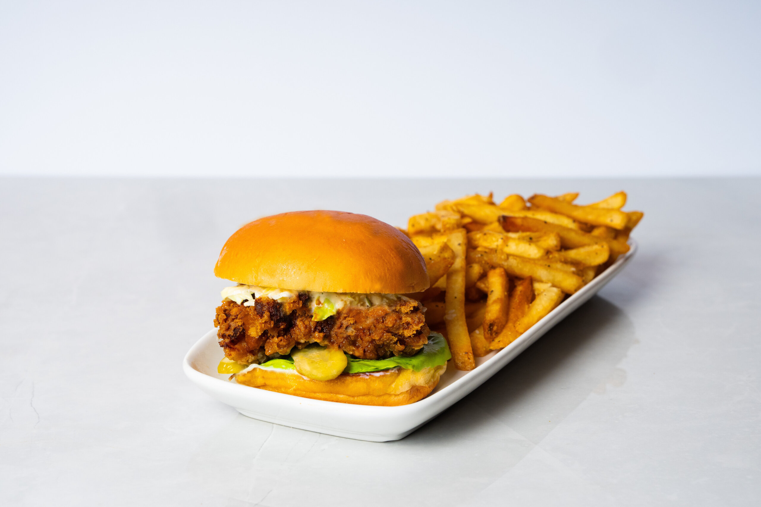 crispy chicken sandwich with fries